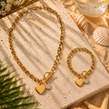 Parure Cœur Éclat Tendance, chaîne dorée à pendentif double cœur et cristaux, fermoir T, acier inoxydable